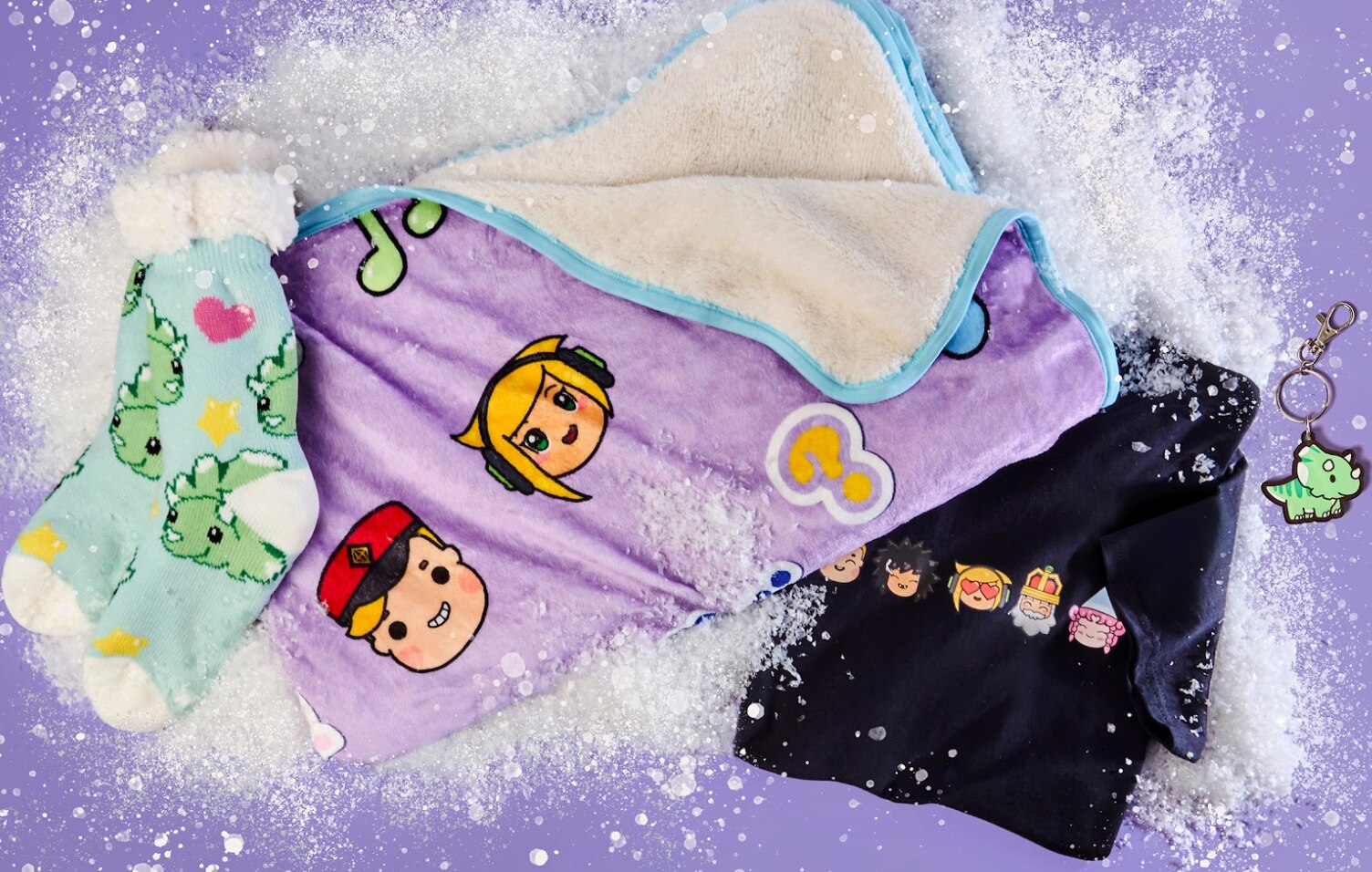 Cute MySims themed merchandise including socks, a blanket, key chain and t-shirt. Each item has designs of MySims characters on it.